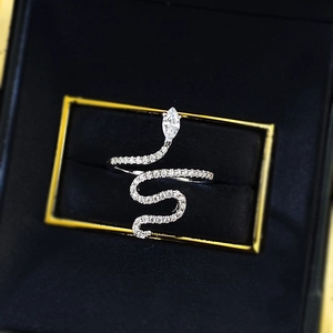 Sparkling silver snake ring with pavé diamonds in a luxury black velvet jewelry box
