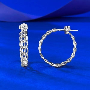 Macro shot of S925 sterling silver hoop earrings with twisted chain texture