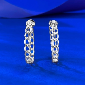 S925 sterling silver geometric hollow cuban link chain earrings on blue background