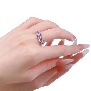 Luxurious S925 silver ring featuring pink and white gemstones in a half-band pavé setting
