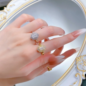 Detail of vintage simulated diamond ring with rectangle ice cut cubic zirconia stone