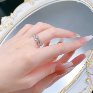 Close-up of S925 silver double-layered lace ring with sparkling zircon inlays on model