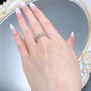 Close-up of S925 silver double-layer lace ring with sparkling pavé cubic zirconia on hand