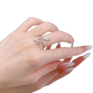 Sparkling snake-shaped silver ring with pavé diamonds and pear-cut gemstone for women