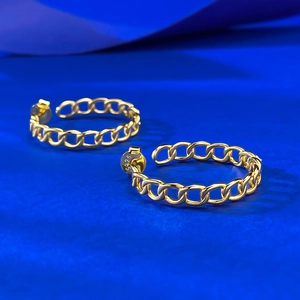 Detailed close-up of S925 sterling silver gold hoop earrings with chain link texture
