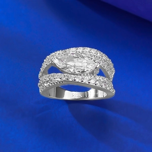 Macro shot of S925 sterling silver stamp and marquise cut diamond ring detail