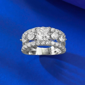 Macro detail of S925 sterling silver ring with princess cut diamond and hallmark