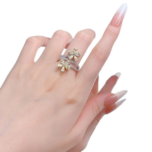 925 sterling silver ring featuring double yellow flower design with sparkling drop-shaped stones