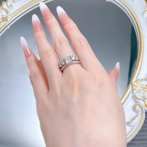 Close-up of S925 sterling silver princess cut square diamond engagement ring on finger