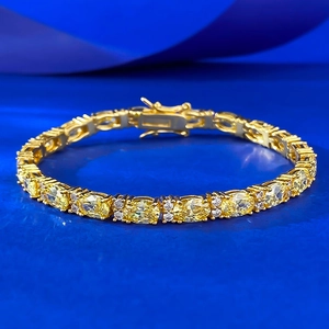 S925 Silber vergoldetes Tennisarmband mit ovalen gelben Edelsteinen und weißen Diamanten