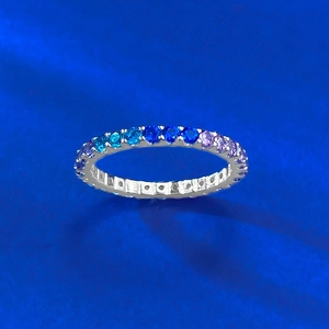 Detailed macro view of S925 silver ring featuring a gradient of purple and blue gemstones