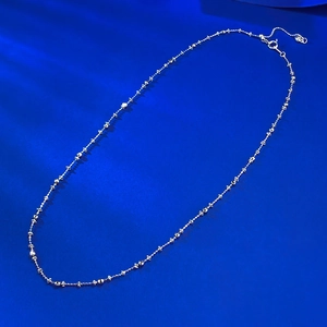 Detail of S925 silver necklace featuring star beads, lobster clasp and adjustable chain
