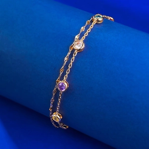 Elegant double-layered gold bracelet with four colorful round-cut gemstones for women