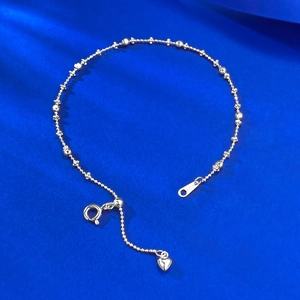 Detail of S925 sterling silver beaded chain bracelet with adjustable heart charm and clasp