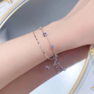 Detail of adjustable silver S925 double-layer bracelet with colorful zircon stones