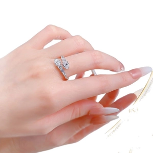 Sparkling S925 silver snake-shaped open ring with full zircons shown on a hand