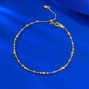 Elegant S925 sterling silver gold beaded bracelet with heart pendant on blue silk
