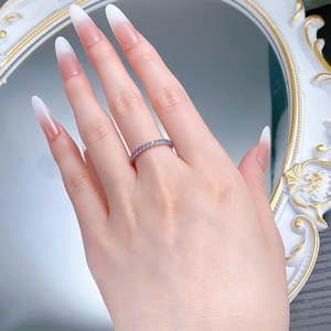 Close-up of S925 silver ring with lavender and blue gradient stones on model's hand