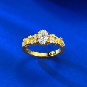 Macro view of S925 hallmark on gold plated sterling silver oval cut ring with side stones
