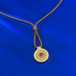 S925 silver gold-plated mandala compass necklace with red stone on blue silk