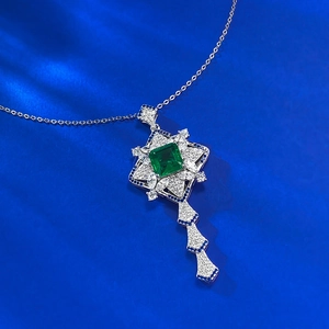 Retro S925 silver necklace featuring an emerald green square stone with blue sapphire border