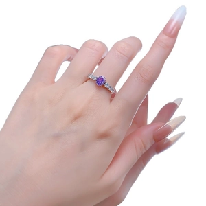 Elegant S925 silver ring featuring an oval purple gemstone and side diamond accents