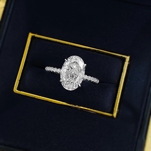 Luxury S925 sterling silver ring featuring a 4.5 carat oval cut ice flower cubic zirconia