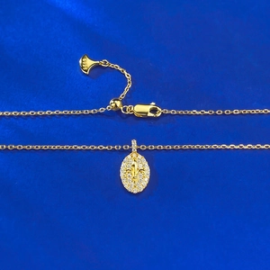 Collier avec pendentif fleur de lys en argent S925 plaqué or et pierres pavées