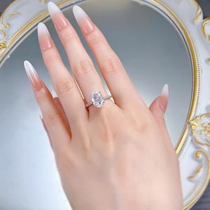 Macro detail of luxury 4.5 carat ice cut oval gemstone ring with micro-paved silver band