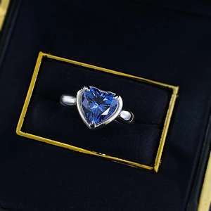 S925 sterling silver ring featuring a 3-carat heart-shaped blue sapphire in a black velvet box