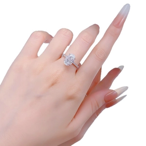 S925 sterling silver ring with 4.5 carat oval ice flower cut gem on model hand