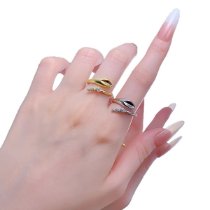 Elegant S925 silver wrap ring with gold plating and zircon accents on female hand