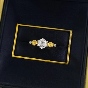 Elegant gold rose flower wreath ring with one carat round cut gemstone in a black gift box