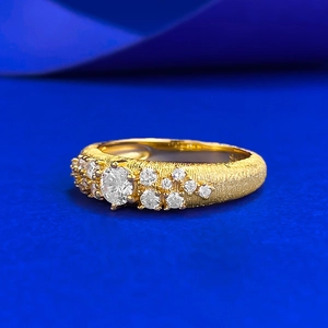 Detailed view of gold plated S925 silver ring featuring brushed texture and starry diamonds