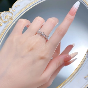 Elegant S925 sterling silver hollow floral lace ring with sparkling cubic zirconia accents