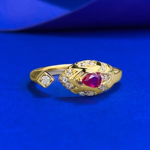 Luxurious gold S925 silver snake ring with red pear ruby and shimmering diamonds