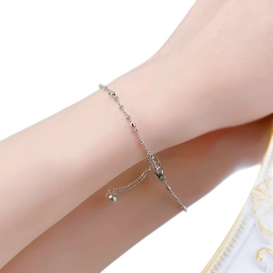 Elegant S925 sterling silver beaded bracelet with heart charm on a female wrist