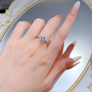 Close-up of S925 silver ring with 2.5 carat round cut diamond shown on hand