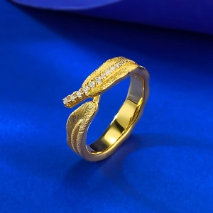 Exquisite gold feather ring with Italian brushed texture and sparkling diamond accents