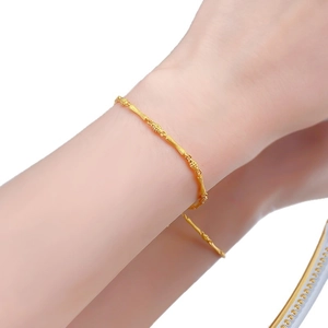 S925 sterling silver bamboo joint bracelet with brushed gold finish on female wrist