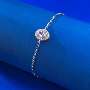 Elegant S925 sterling silver bracelet with oval pink gemstone and pavé accents