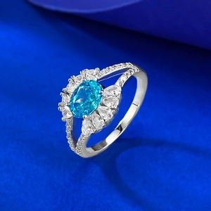 S925 silver ring with oval aquamarine stone and teardrop accent diamonds in split-shank design
