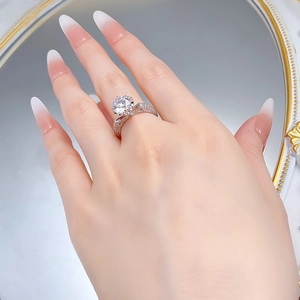 Close-up of S925 silver ring with 2.5ct round main stone and bow hollow detail
