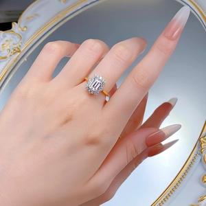 Luxurious S925 silver halo ring with emerald cut white zircon and gold plating