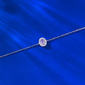Elegant S925 sterling silver bracelet featuring a pink oval gemstone with white halo