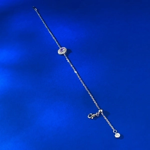 Detail of S925 silver bracelet with oval purple gemstone and lobster clasp