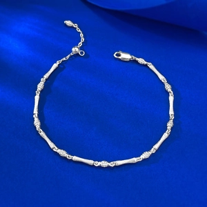 S925 sterling silver bamboo joint bracelet on blue silk background with adjustable chain