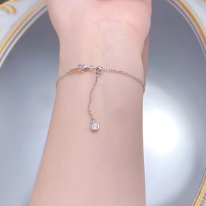 Detailed view of S925 silver bracelet with adjustable slider and lobster clasp on wrist