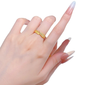 Elegant gold leaf ring with Italian brushed finish and sparkling diamond accents