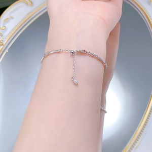 Detail of S925 sterling silver bamboo joint bracelet with adjustable slider clasp on wrist